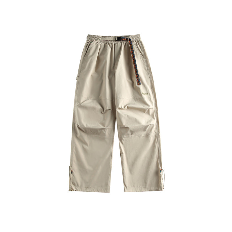 Solid color minimalist waistband casual pants for men with drawstring leg ties