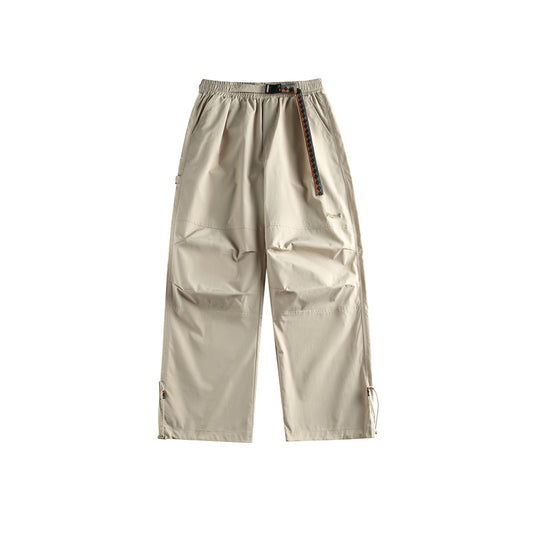 Solid color minimalist waistband casual pants for men with drawstring leg ties